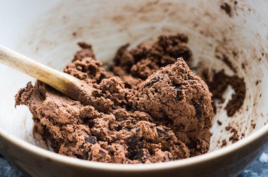 Edible cookie dough in a mixing bowl