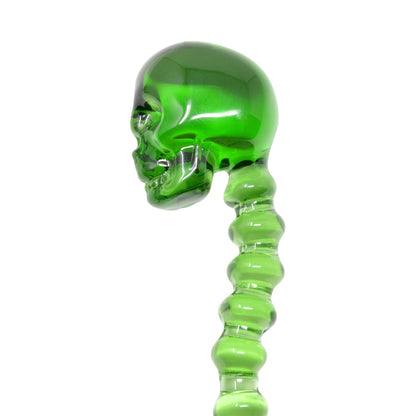Green handy glass dab tool dabber smoking accessory with a skull handle and vertabrae style body pointed end