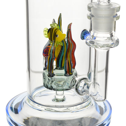close up clear glass bong smoking device splash guards cone bowl with handle fish figures inside an aquarium look